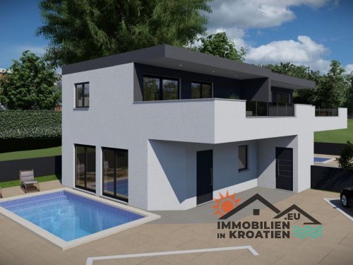 Zwei im Bau befindliche Villen mit Swimmingpools direkt am Meer